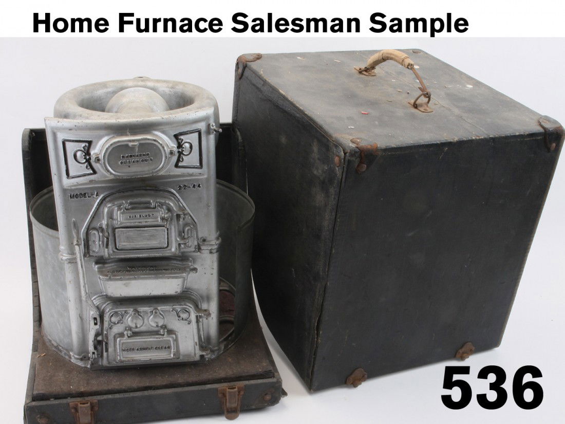 Home Furnace Salesman Sample: an elaborate fully functional model of primarily cast aluminum in original carrying case, displays all aspects of functionality including ash shaker and removable water reservoir for humidification -