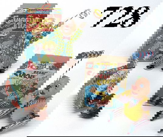 Lot: 3 Japanese Clown Toys - 2 with boxes: cloth dressed figured on lithographed tinclockwork toys, celluloid clown on rocker operates on pull string attached to dressed monkey, the 2 boxed toys have vinyl heads rocker toy 5.5" t.