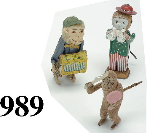 Lot: 3 Monkey Toy Wind Ups: clothed dressed and tin, includes organ grinder with "plink-plunk" music, binocular user (all tin), and a dapper simian combing hair and holding mirror tallest 6" t.