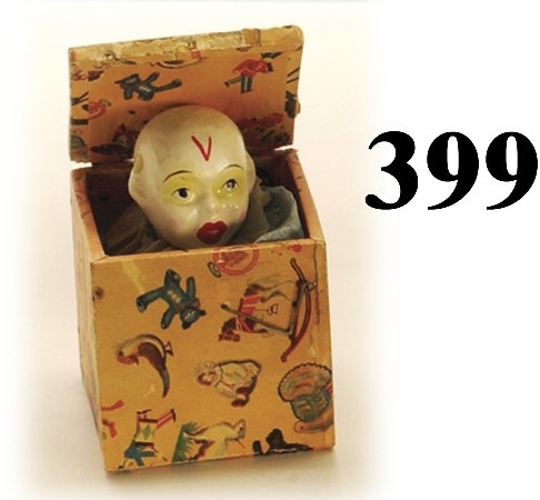 White Head Clown Jack-in-the Box: White Head Clown Jack-in-the Box painted composition and tissue squeaker figure in paper covered wood box 6" t. open very good to excellent (paper damage to front edge of lid, name written in ink on l