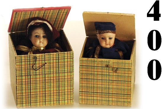 Lot: 2 Porcelain Head Jack-in-the-Box: Lot: 2 Porcelain Head Jack-in-the-Box cloth dressed squeakers in paper on wood boxes, heads are circa 1920-30 but overall construction is probably post war larger 7.5" t. open excellent