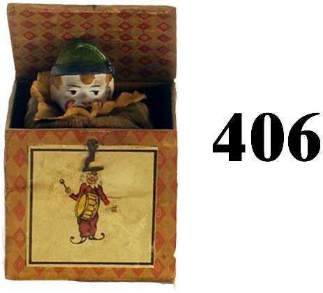Boy Face Clown Jack-in-the-Box: Boy Face Clown Jack-in-the-Box painted composition and tissue figure in paper on wood box 6" t. open very good to excellent (minor staining to front decal)