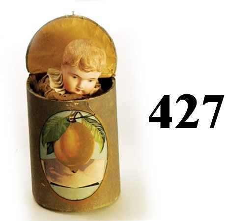 Baby Boy Round Jack-in-the-Box: Baby Boy Round Jack-in-the-Box painted composition and tissue figure in paper covered heavy cardboard canister, beautiful detail and color on face, stamped Germany on base 7" t. open excellent (slight