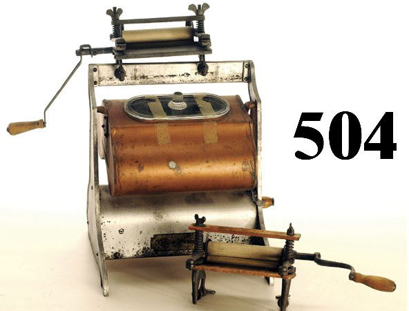 Kiddie Washing Machine and extra Wringer: Kiddie Washing Machine and extra Wringer clockwork cast aluminum and steel with glass lid, original decal on base; along with a miniature Horse Shoe Brand #2 Gem wringer made by the American Wringer C