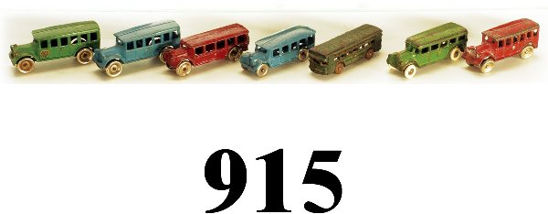 Lot: 7 Buses - various makers: Lot: 7 Buses - various makers painted cast iron, 3 Arcade, 1 Hubley and 3 A.C. Williams appr. 5" l. each good to very good (paint chipping and wear esp. on Williams twin coach)