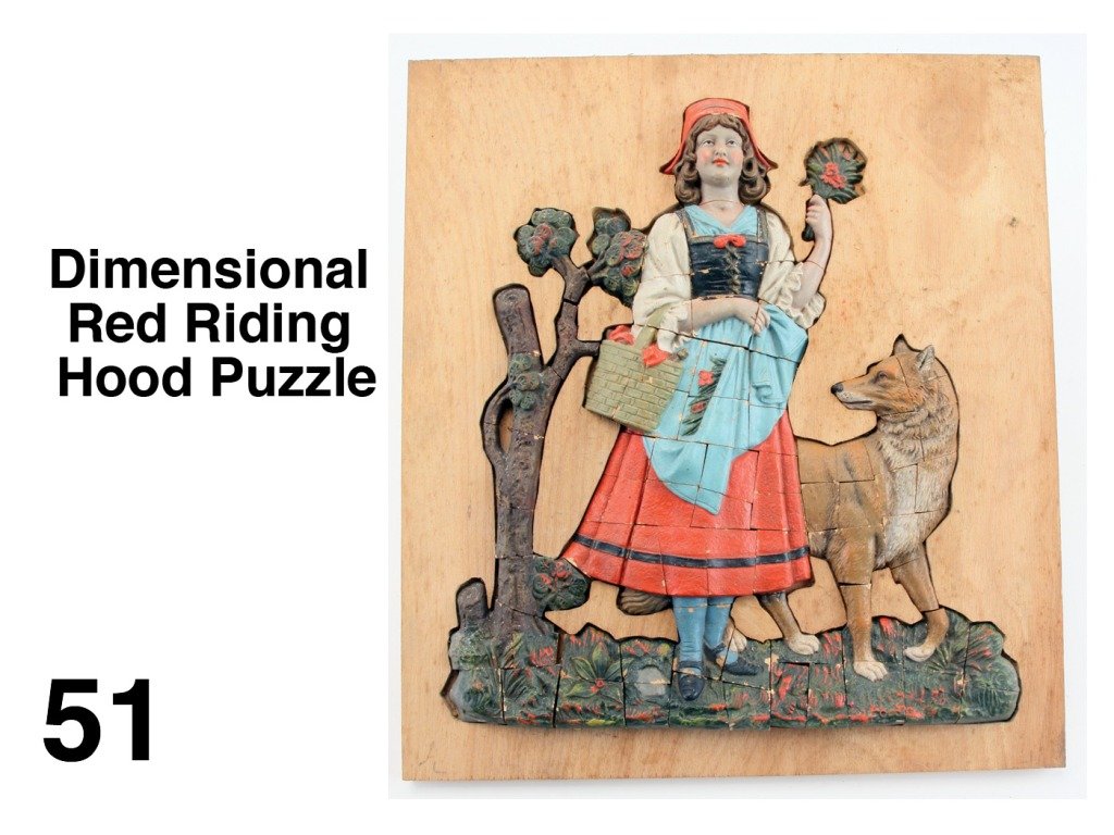 Dimensional Red Riding Hood Puzzle: early, circa 1905, puzzle depicting the girl and the wolf, made of a painted ceramic material which renders great detail in over 70 pieces which form the picture in deep relief with bright colors, ret