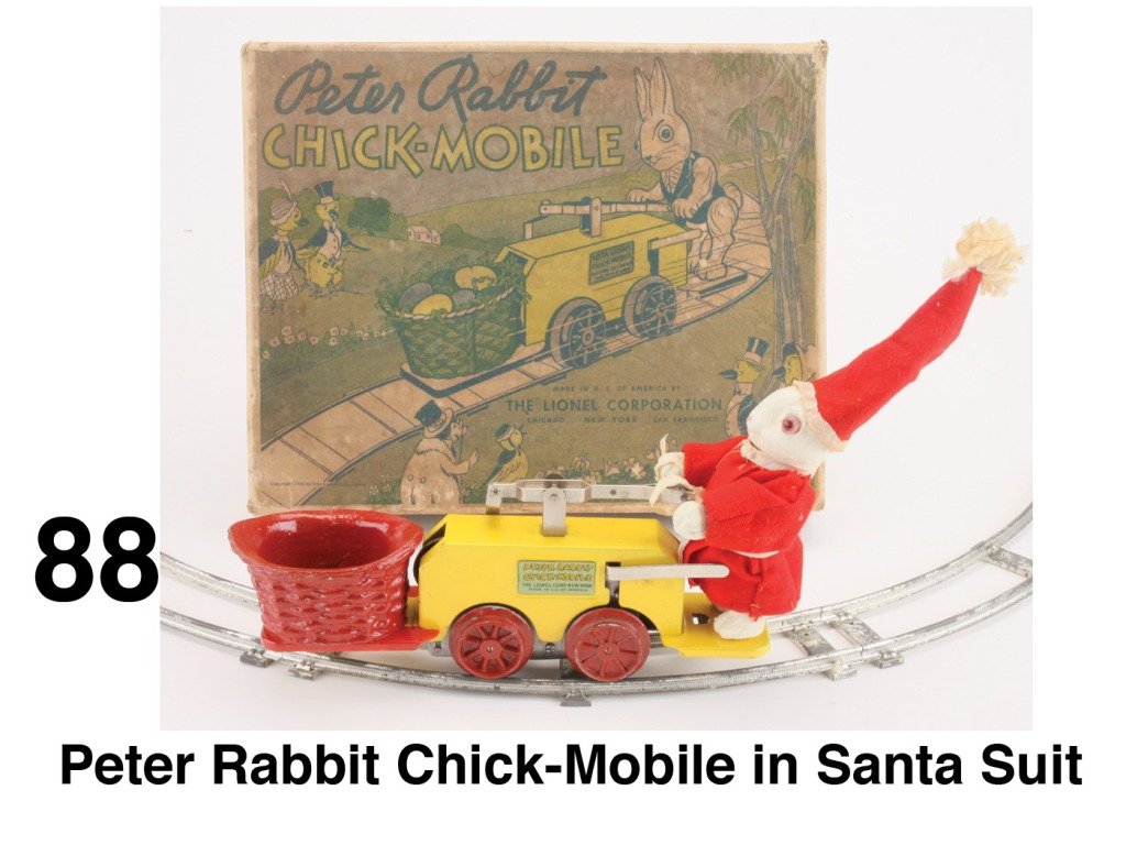 Peter Rabbit Chick-Mobile in Santa Suit: Lionel 1103 clockwork handcar with painted composition Peter Rabbit; although in this version of the classic toy, Peter is dressed in a well made Santa suit with hat and the basket and wheels have bee