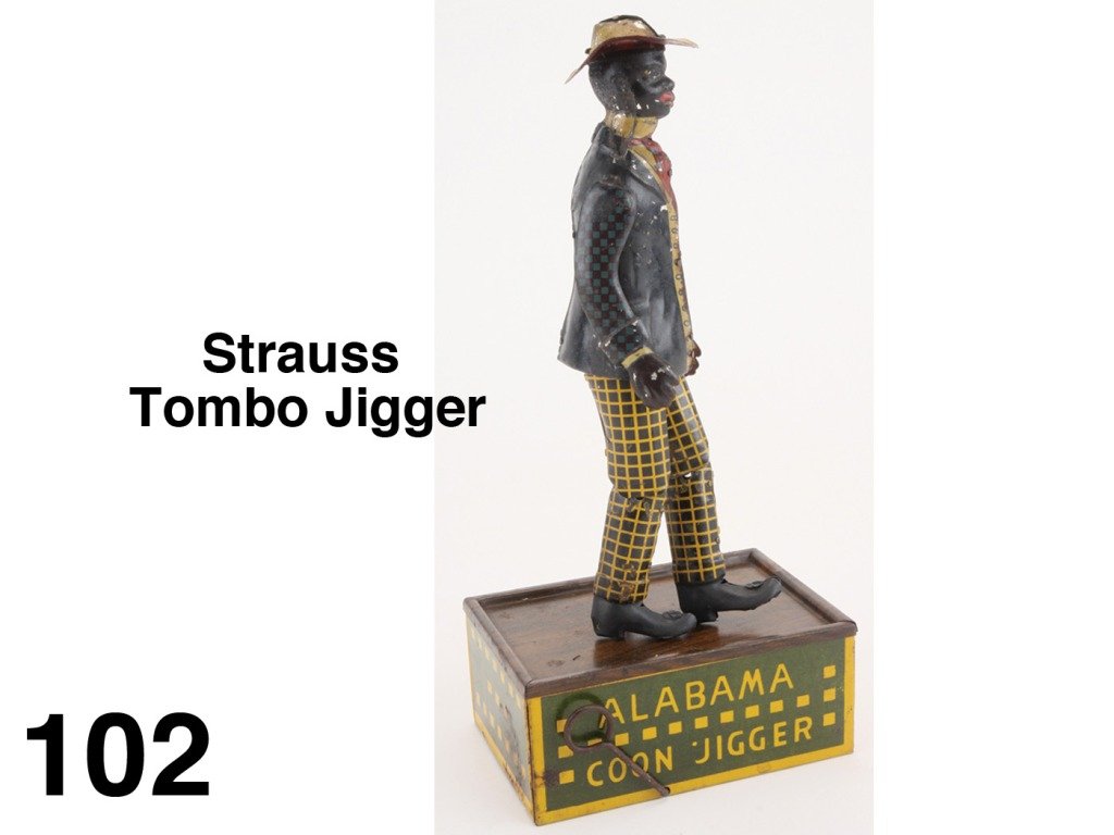 Strauss Tombo Jigger: lithographed tin dancing figure on base enclosing clockwork mechanism, made by Ferdinand Strauss Size: 10" t,