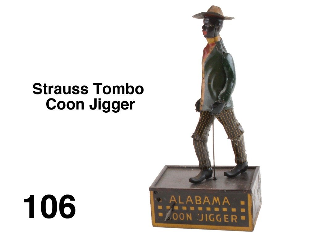 Strauss Tombo Coon Jigger: lithographed tin clockwork toy, classic American tin dancing toy Size: 10" t.