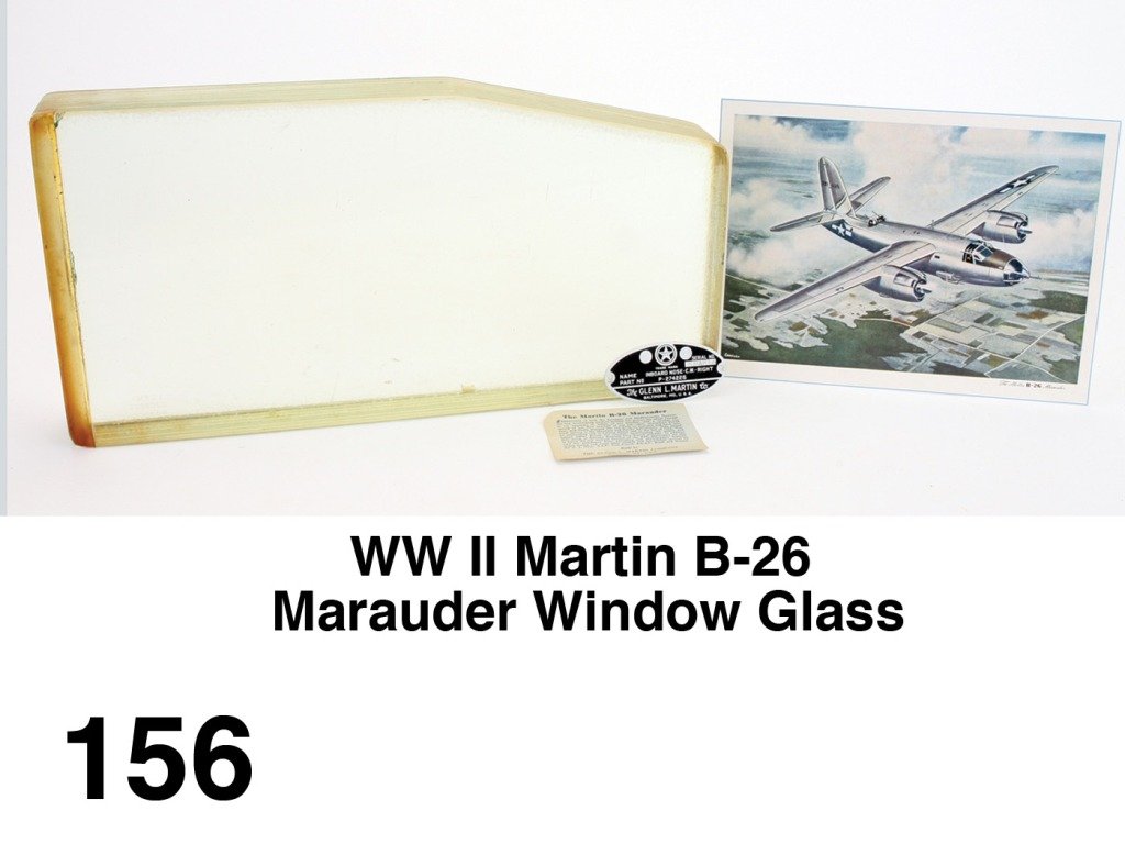 WW II Martin B-26 Marauder Window Glass: this side window panel from a famed Marauder built by the Glenn L. Martin Co. is made up of 9 fused layers of glass weighing a hefty 27 lbs. The B-26 was a medium twin engine bomber first used in 1942
