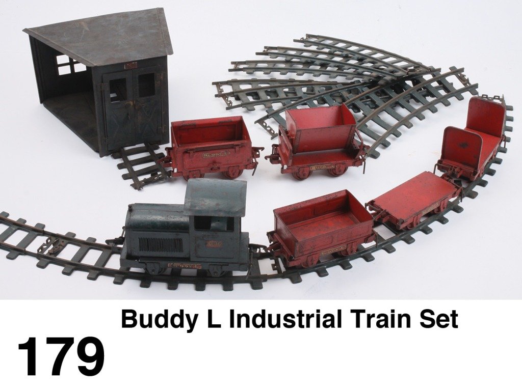 Buddy L Industrial Train Set: pressed steel train set with locomotive and all 5 style cars along with 12 pieces of interlocking curved track and 1 section of round house (made to hook together with others and thus has open side) r