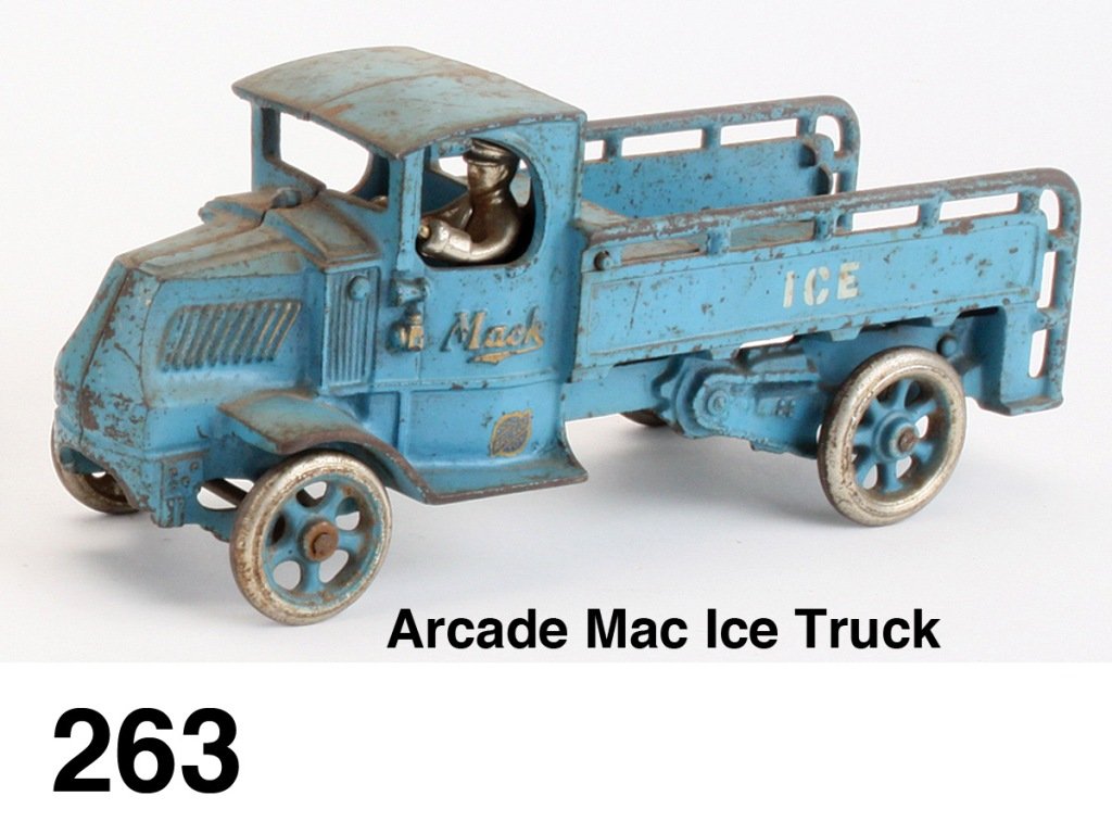 Arcade Mack Ice Truck: painted cast iron and steel, Mack cab with service body stenciled 'ICE', nickel plated spoke wheels with painted centers, retains original decal and driver Size: 11" l.