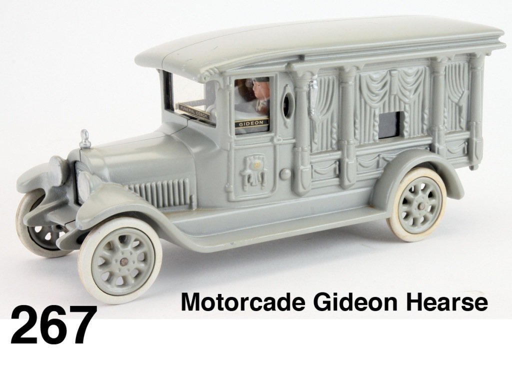 Motorcade Gideon Hearse: painted cast iron with rubber tired wheels, 2 drivers, Gideon Funeral Coach decals on Plexiglas windows and rear opening doors- one retains original Motorcade decal 'An Original Motorcade Toy Larry Se