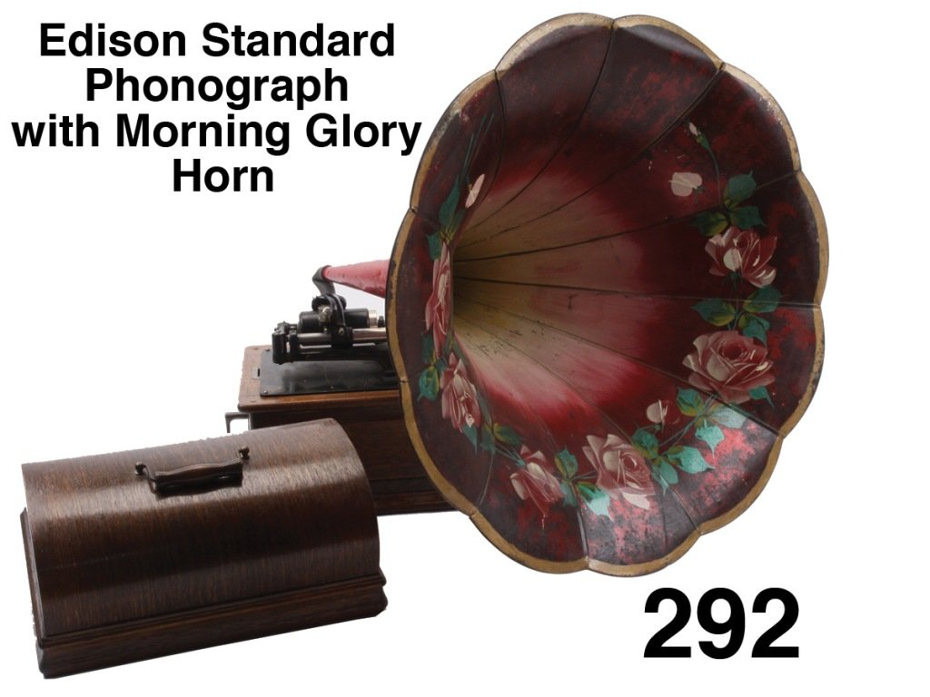 Edison Standard Phonograph with Morning Glory Horn: Edison cylinder phonograph with painted rose decorated 33" morning glory horn; offered with 2 cylinders and a can-8469 Duet Its a lovely Day for a Walk and 9672 Dixie Minstrels Size: 18" w. x 12.5" d.