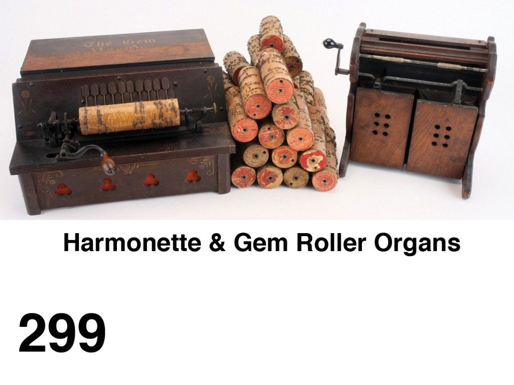 Harmonette & Gem Roller Organs: circa late 19th century, stained wood hand crank operated roller organs. The larger Gem has stencil decorated top and sides and retains paper direction label on underside; the smaller Harmonette also