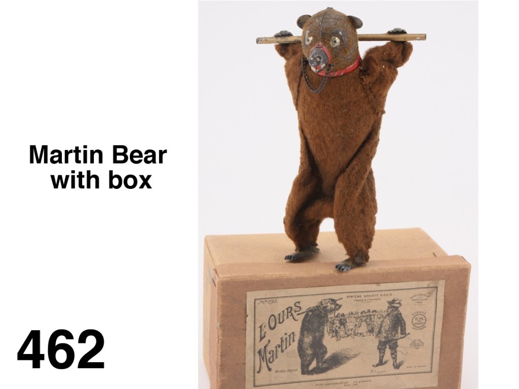 Martin Bear with box: cloth covered painted tin and cast metal with clockwork mechanism, this ursine performer by Martin is offered with original box with illustrative label Size: 8" t.