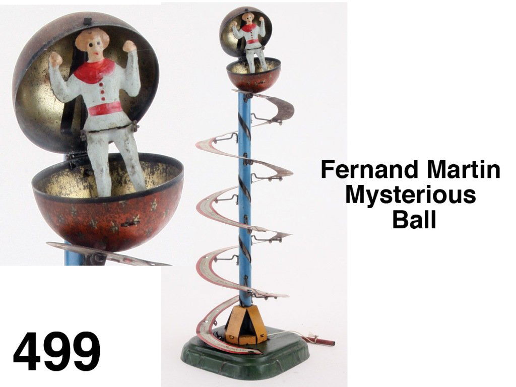 Martin Mysterious Ball: painted and lithographed tin, certainly among the most complex toys by the great French firm Martin, pull string to wind and the ball rolls up the spiral then reaches the top where the ball pops open