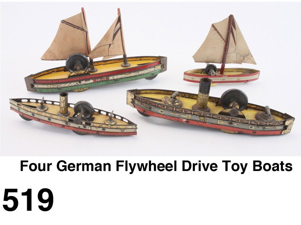 Four German Flywheel Drive Toy Boats: lithographed tin boats with flywheel inertia drive mechanisms, includes 2 gunboats and 2 sailing craft (1 with replaced sales and the other with repaired original paper sail) all have eccentric front