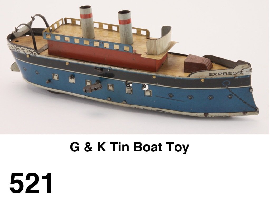 G & K Tin Boat Toy: lithographed tin with clockwork mechanism - a 2 stack liner named Express, made by Greppart & Kelch - not well known for boats Size: 9" l.