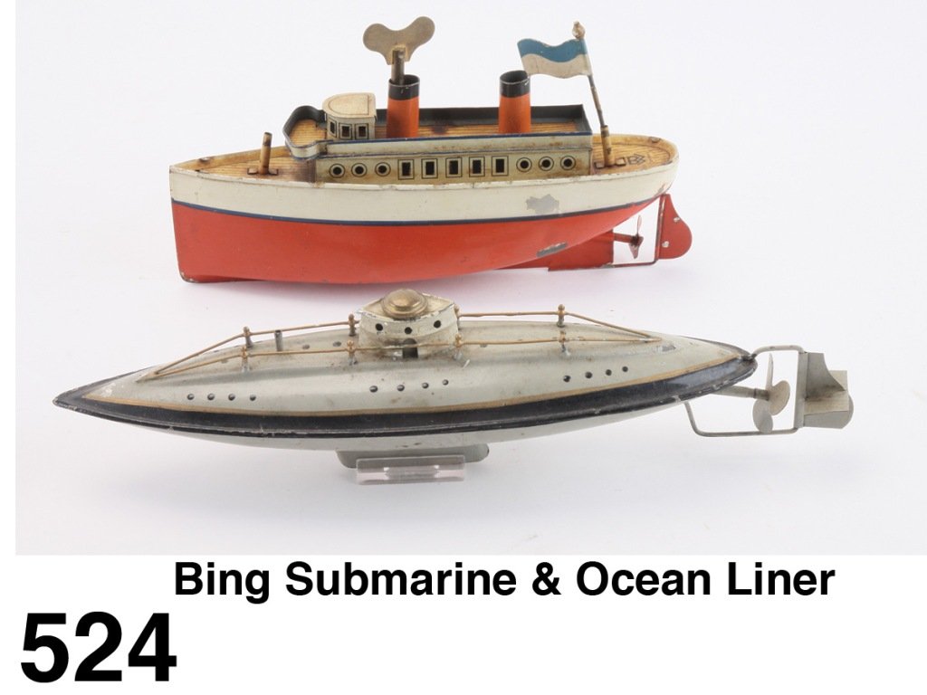 Bing Submarine & Ocean Liner: painted and lithographed tin, both with clockwork motors Size: 8.5" & 11.5" l.