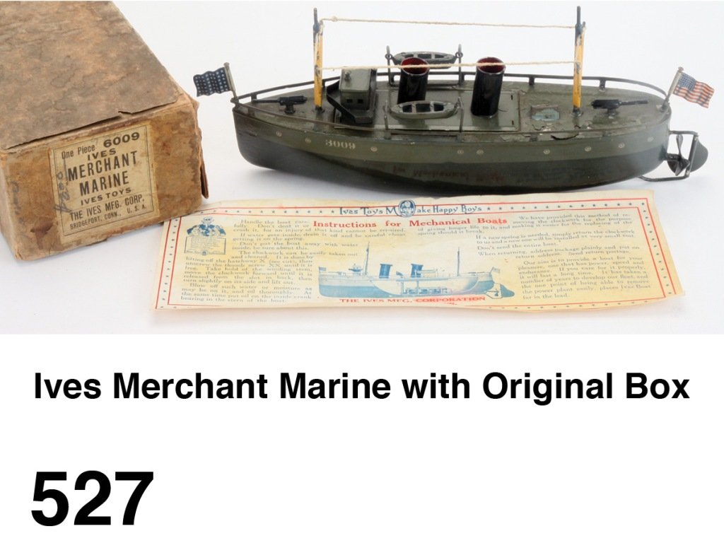 Ives Merchant Marine with Original Box: painted tin clockwork freighter retaining masts, 2 flags and cast iron wind key in original box with label '6009 Ives Merchant Marine Toys' and scarce instruction sheet Size: boat 10.25" l.