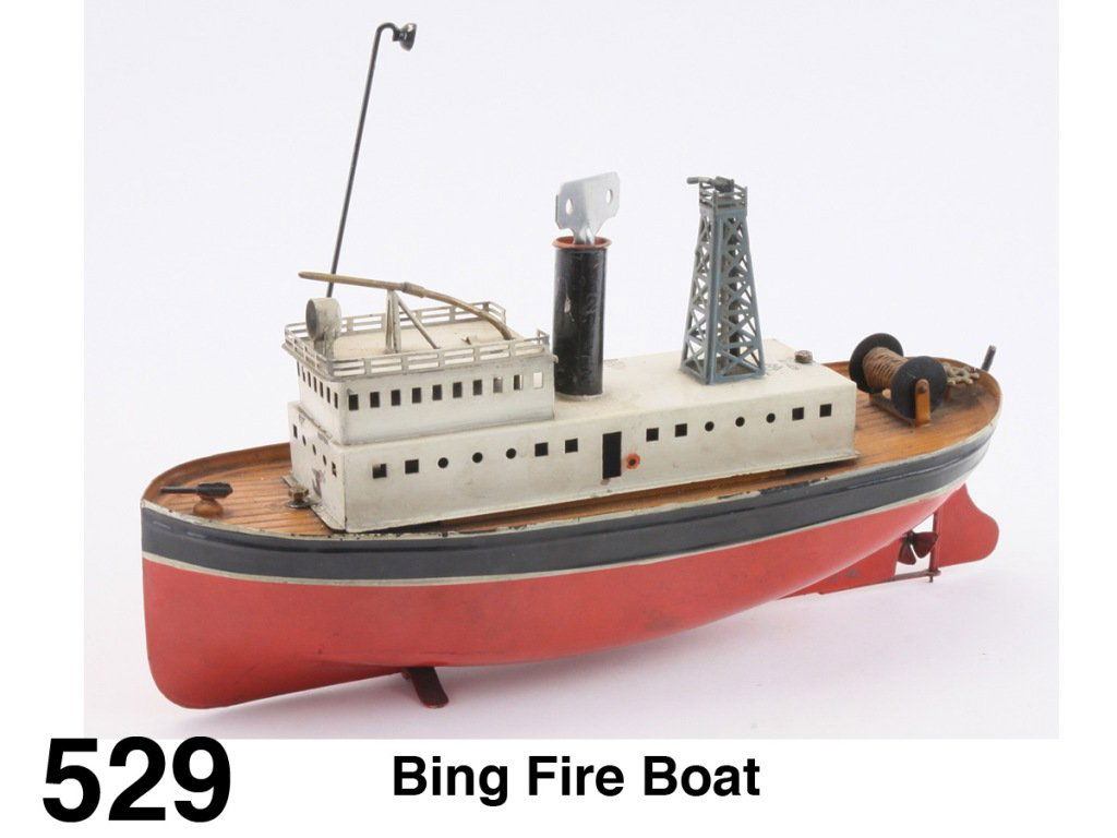 Bing Fire Boat: painted tin, pierced tin superstructure, embossed tin deck, clockwork mechanism, a fairly scarce Bing craft Size: 12" l.
