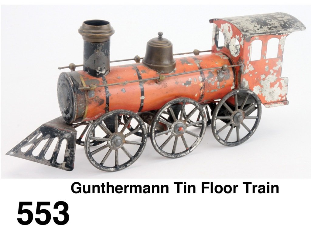 Gunthermann Tin Floor Train: painted tin clockwork 0-6-0 floor locomotive Size: 13" l.