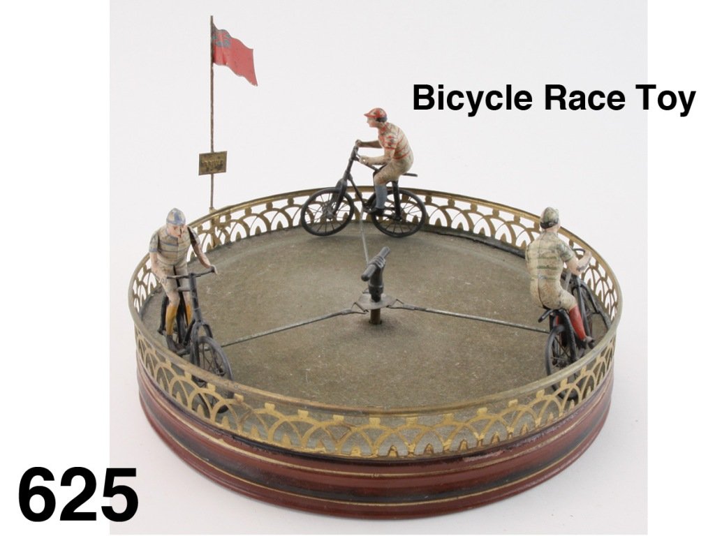Bicycle Race Toy: hand painted tin depicts 3 early bicycle riders (each with a different colored stripe shirt) which race in circles to finish at the lithographed tin'Arrivie' flag; powered by the central clockwork mec