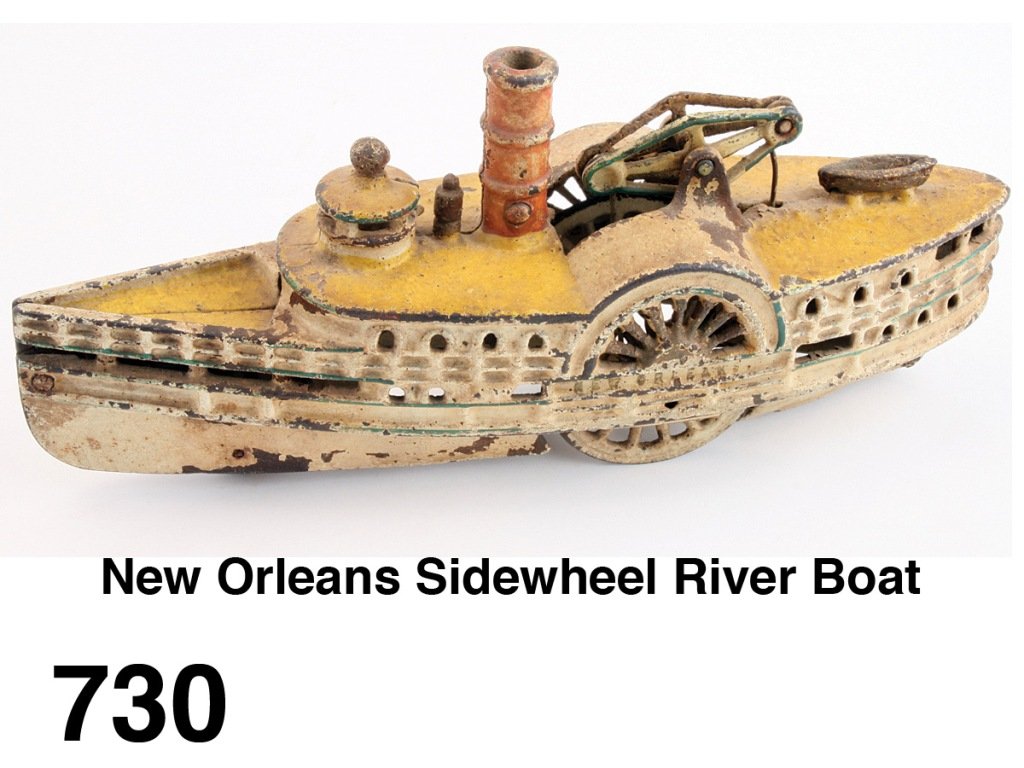 New Orleans Sidewheel River Boat: painted cast iron with moving walking beam, name New Orleans more easily discernible on 1 side Size: 10.25" l.