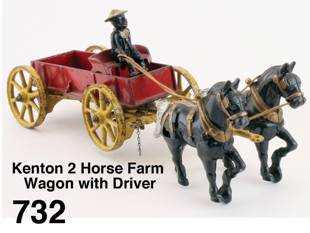 Kenton 2 Horse Farm Wagon with Driver: painted cast iron with nicely detailed horses and original figure of Black man driver with straw hat - a better than average example with some play wear on wheels Size: 15.5" l.