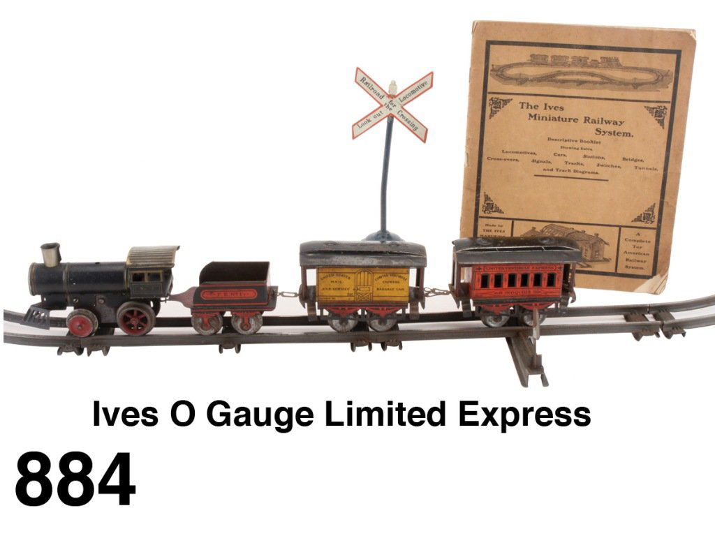 Ives O Gauge Limited Express: lithographed and painted clockwork American steam profile No. 2 loco, F.E. No. 1 tender, yellow mail/baggage car and red Iroquois coach. Offered with Marklin crossing sign (slight bend to pole), 12 pi