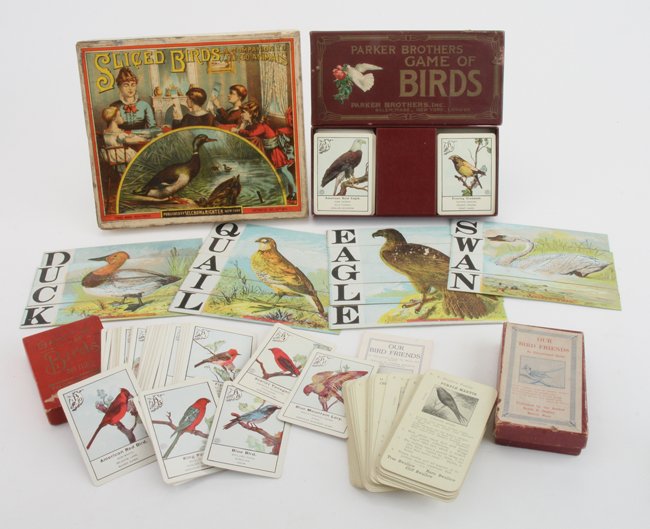 A Group of Bird Theme Games: three bird theme card games depicting a variety of bird images and a complete set of Selchow & Righter Sliced Birds puzzle strips which make 14 colorful images of a variety of birds S & R box 9" x 8"