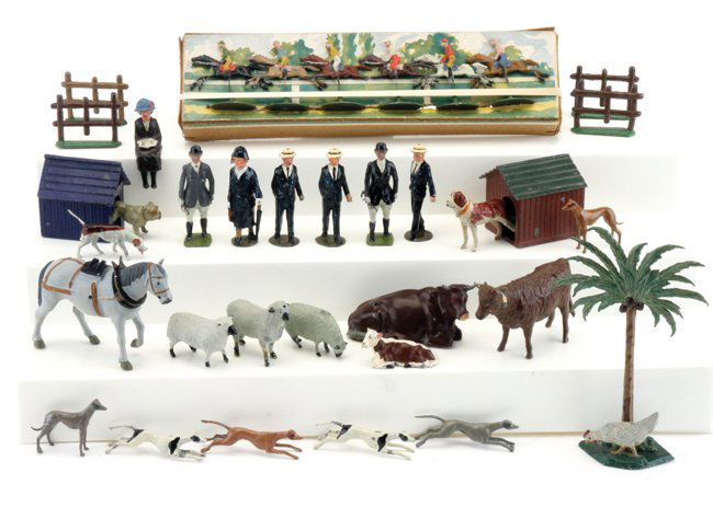 Lead Figures - People & Animals: painted lead - mostly Britains - 6 people, 10 dogs - 2 with houses, etc., along with a boxed set of steeplechase figures in brighly colored paint schemes people 2.25" t.