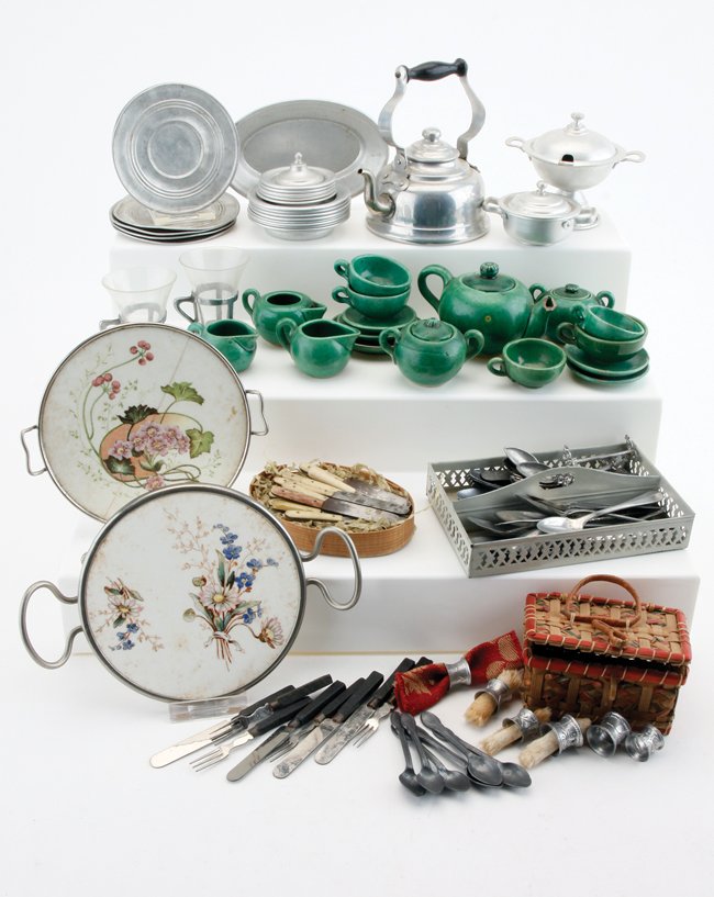 Child's Size Tea Set, Tin & Flatware: child or doll size dishes; 2 Marklin china platters (1 with crack), 19 piece green ceramic tea set (spout broken), 24 pieces of various tinware and over 50 pieces of flatware, pierced tin caddy and sm