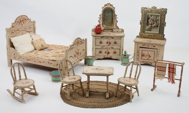 Dolls' Size Bedroom Grouping: very nicely crafted and painted wood dolls' bedroom suite with bed, dresser, commode, table, 2 Windsor side chairs and rocker; This suite is offered with oval rag rug, German painted tin water/wash se