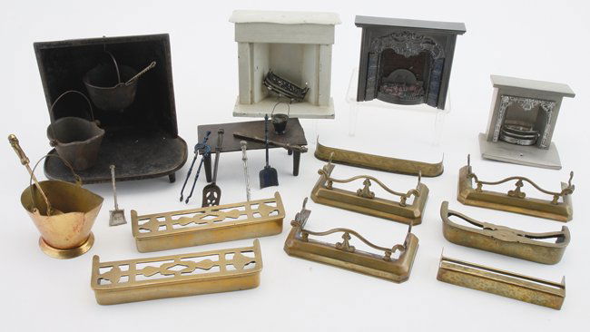 Fireplaces, Mantels, Fenders & Impliments: various cast iron, brass, copper and soft metal accessories including cast iron fireplace pot, bench and scuttle, embossed painted wood fireplace, 2 painted tin mantels, and several brass fenders most