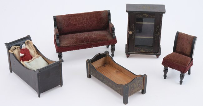 Waltershausen Beds, Sofa Etc.: German, mid to later 19th century, rosewood tone wood grouping includes 2 beds, 1 with tiny frozen Charlotte (missing 1 arm), upholstered sofa with side chair (wear to fabric, trim a later addition) a