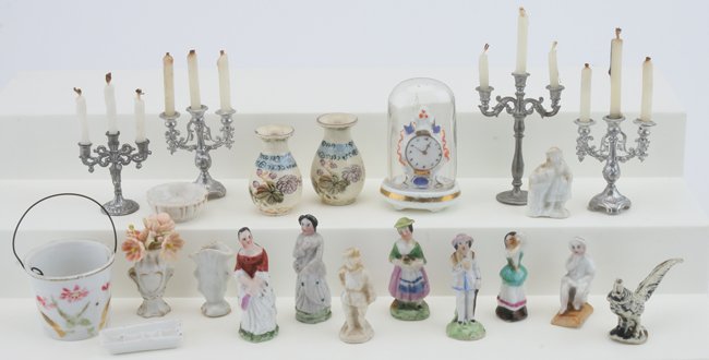 Dolls' House Figurines & Candelabras: unmarked glazed porcelain grouping including clock with glass dome, 7 figures in various colonial and Tyrolean attire, seated child, pheasant, chamber pail and dish, several vases (a few with minor ch