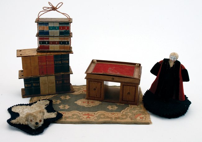 Desk & Bookshelve Candy Boxes: candy/surprise boxes include 2 book shelves (larger missing cording)and desk along with china doll penwipe, felt carped and faux bearskin rug desk 3.75" w. x 2.25" t.