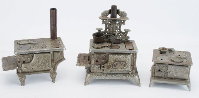 Three American Cast Iron Toy Stoves: all of nickel plated cast iron and steel, includes an A Hubley Eagle, an Ideal OK, and a Kenton A1 largest 8" w.