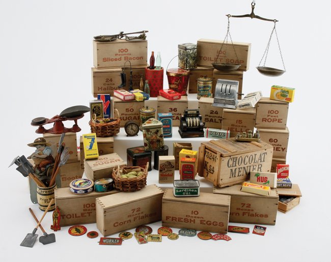 Country Store Stock Etc.: generally larger scale items for a general store or grocery; included is a French wooden chocolate crate, 21 dovetailed marked wooden crates (empty), Ceresota match holder with farm implements, 2 cash
