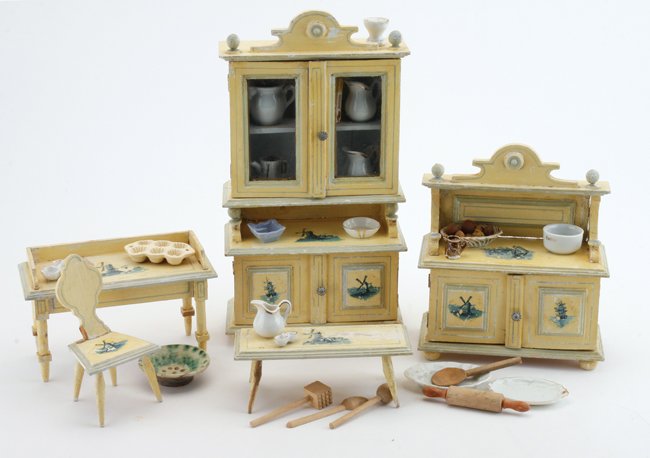 Painted Wood Kitchen Set: German, 5 piece painted wood furniture with blue transfer design: glass door tiered cupboard, side board (missing 2 ball finials), work table, chair (small chip in back), and bench along with china an