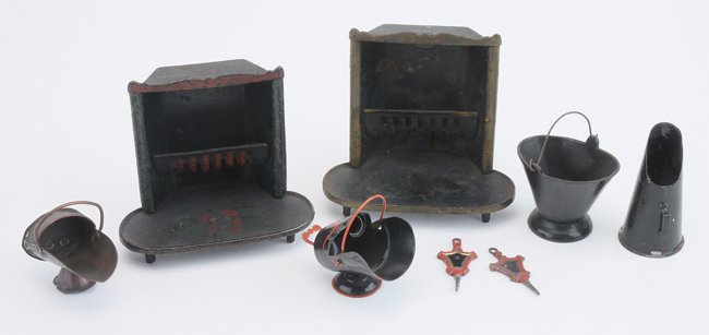 Fire Places and Scuttles: a pair of Stevens and Brown painted cast iron fire places with grates and coal bucket along with 3 European brass and tin scuttles and 2 soft metal bellows fire places appr. 4.25" w. x 3.75" t. ea.