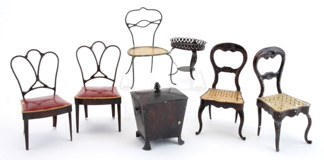 Rock & Graner Chairs, Table, Etc.: circa mid to later 1800's painted tin grouping includes 5 side chairs - 2 with heavy cast metal legs, 1 cafe chair with pierced tin seat and 2 arched backs with straight leg chairs, cellarette (no int