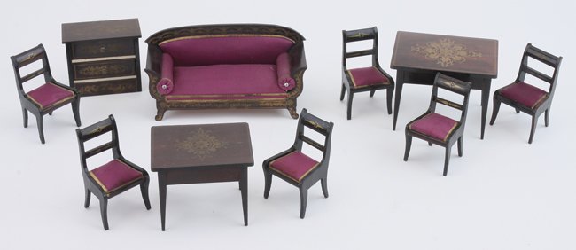 Waltershausen Parlor Suite: German, mid 19th century, smaller scale parlor grouping with sofa and 6 chairs all upholstered in purple silk with gold paper trim edging along with 2 tables and 2 drawer cabinet with gilt transfer de