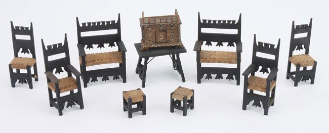 Early Miniature Handmade Furniture: black stained wood with very precisely detailed carving and hand made woven checker board pattern seats; 9 piece grouping with table and 2 each - settes, arm chairs, side chairs and foot stools; also