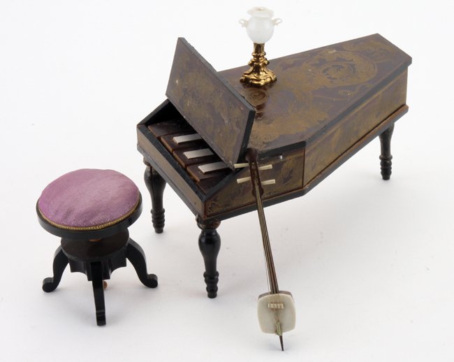 Waltershausen Harpsichord: rosewood toned wood with gilt transfer decoration on early reverse colored key musical instrument (lid is stationary in open position) offered in situ as pictured in Antique Doll's Houses © 2005 Flor