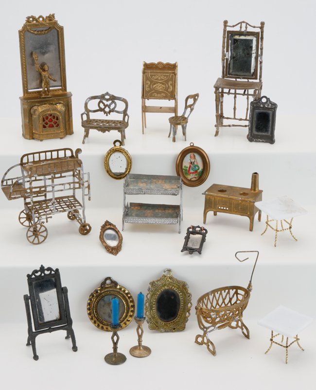 Small Scale Gilt Metal Accessories: gilt metal grouping by Gerlach, Simon & Rivollet and other makers; includes tea carts, wall mirrors, cradle, desk, mantel with mirror, etc. mantel with mirror 4" t. x 1.75" w.