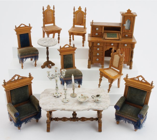 Schneegass Dining Room Furniture: marble top trestle table, tiered sideboard (missing 1 rear foot), 2 arm and 2 side chairs upholstered in blue velvet, 3 wood and rattan side chairs (warping to 1 chair bottom), marble top accent table