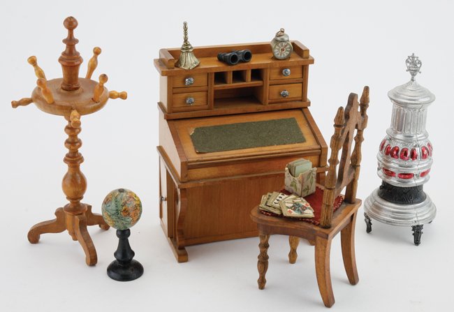Captains Davenport Desk & Accessories: stained wood miniature form of this somewhat odd desk first commissioned in the late 1700's with slantfront , side drawers on 1 side and cupboard on other; offered with small globe, miniature deck of